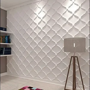 Textured 3D gypsum wall panels creating a decorative feature.