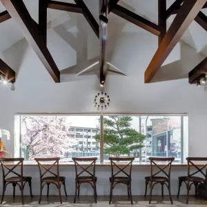 Stylish interior with decorative ceiling beam accents.