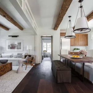Decorative ceiling beams in a bright modern room.