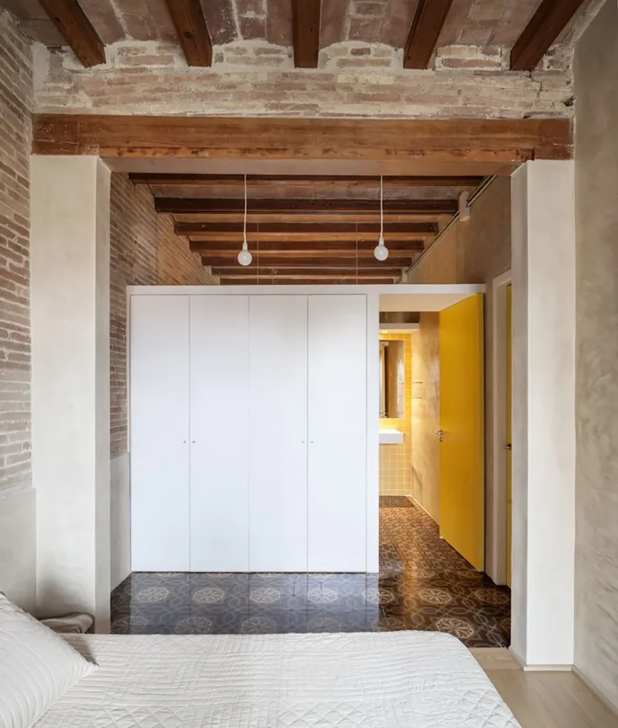 Contemporary home with exposed beam ceiling design.