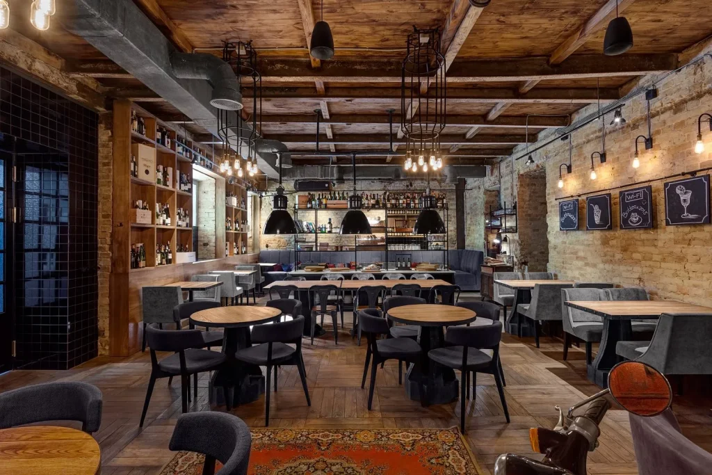 Loft-inspired café with decorative wall cladding.