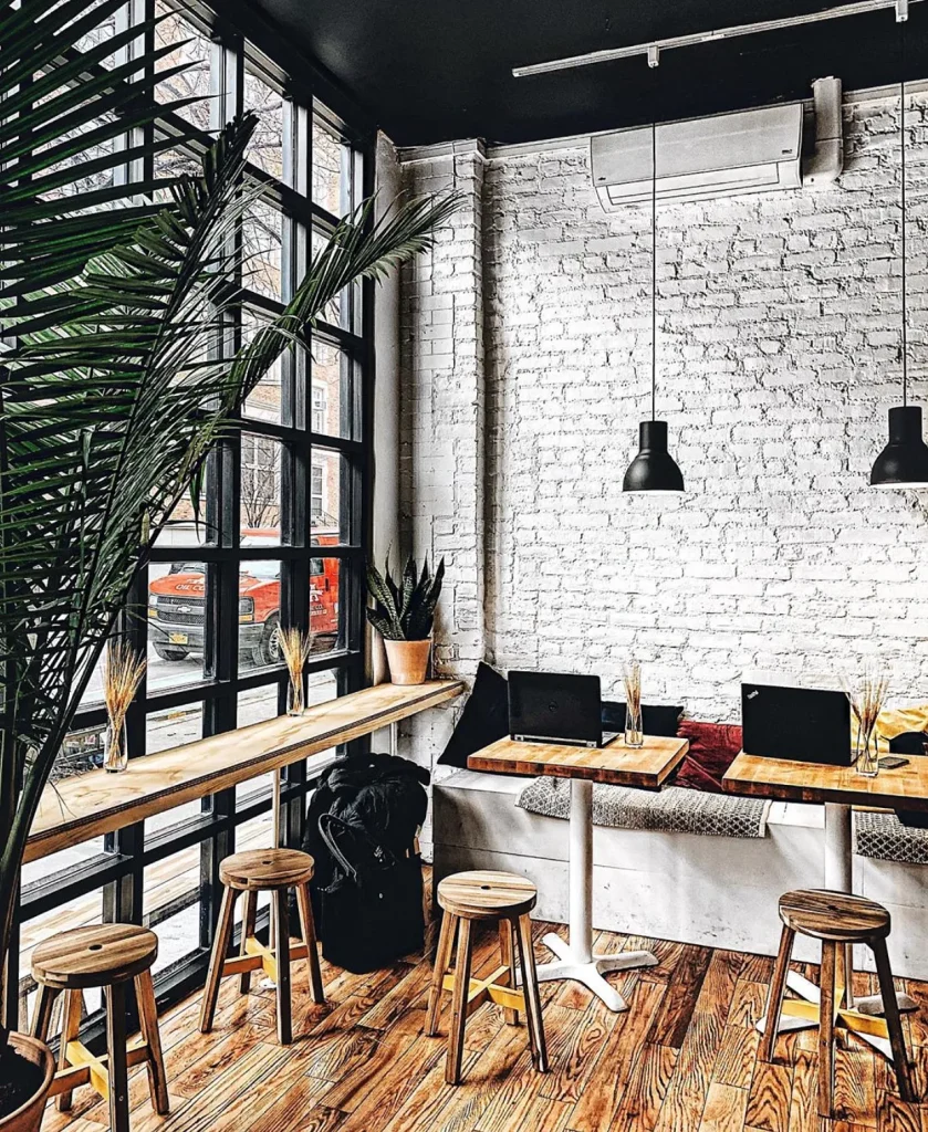 Stylish industrial café with contemporary furniture.