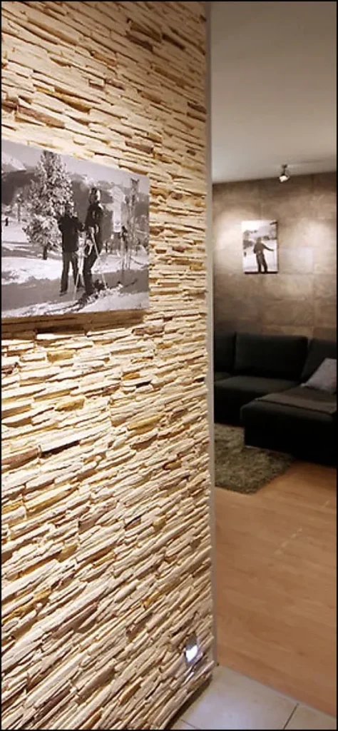 Decorative stone wall design in a residential hallway.
