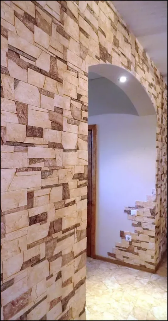 Interior hall with decorative stone feature wall.