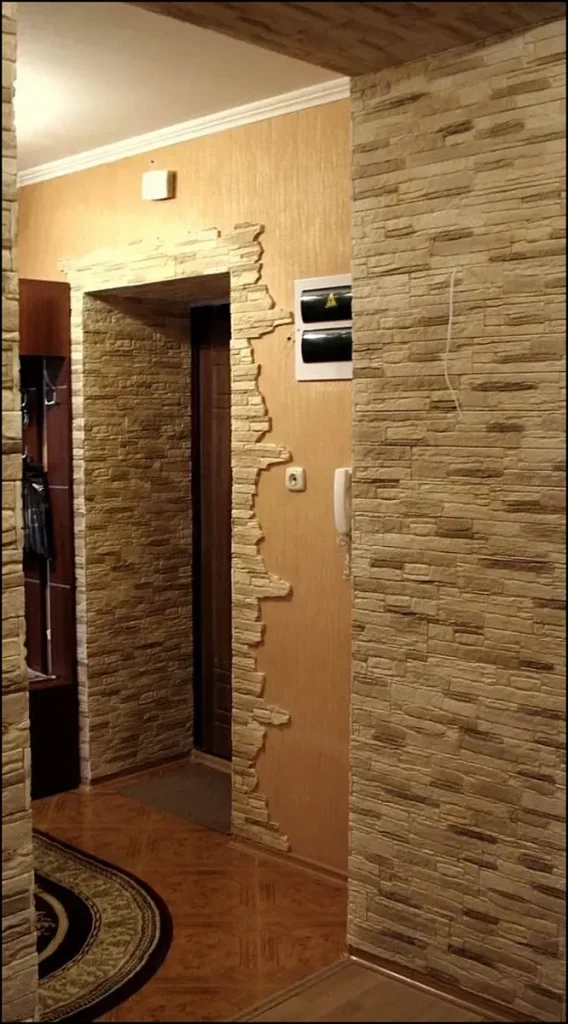 Interior hallway with textured decorative stone finish.