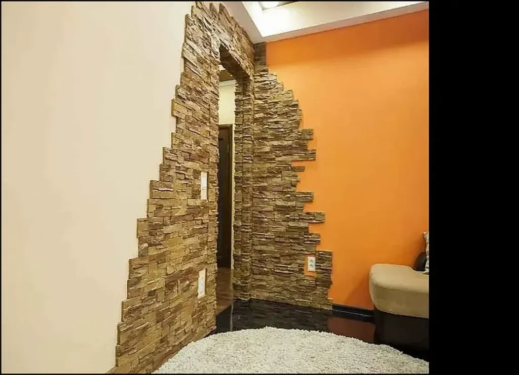 Decorative stone wall in a modern home entrance.