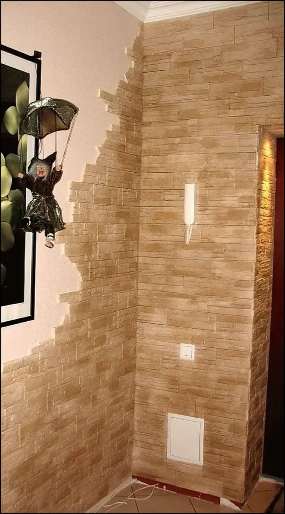 Stylish hallway with decorative stone wall covering.