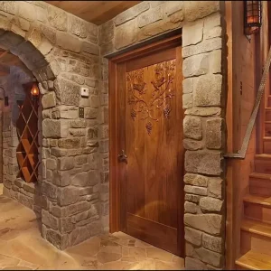Modern entrance corridor with textured stone cladding.