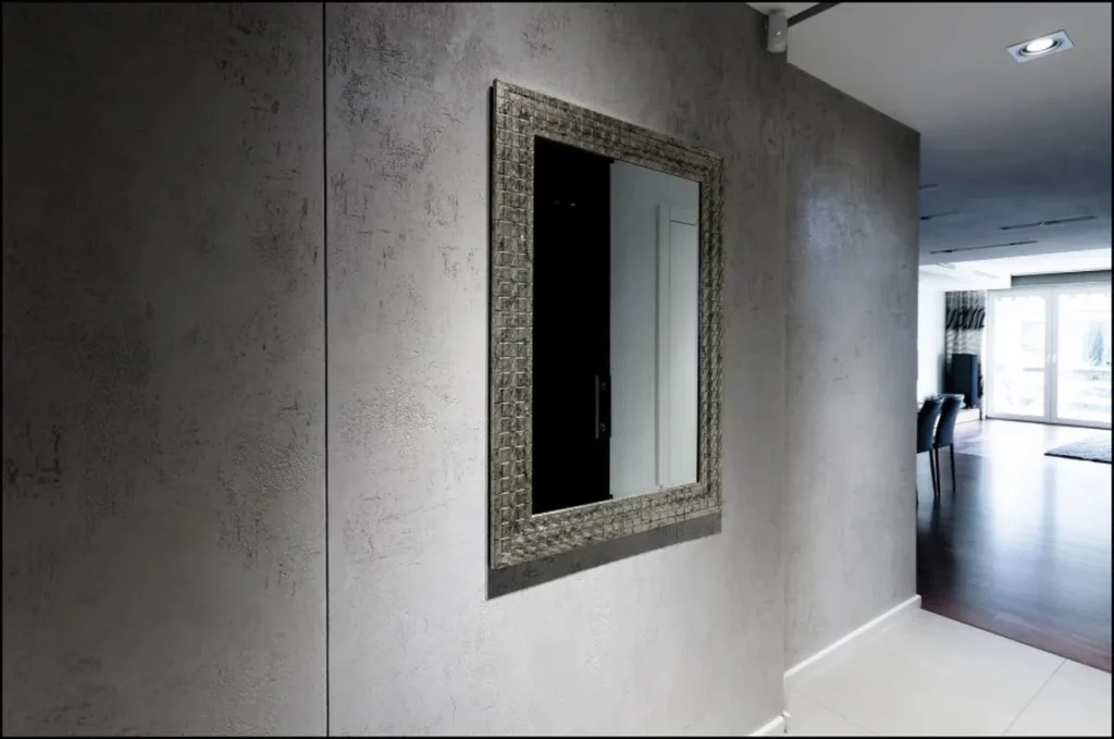 Stylish room with a decorative concrete feature wall.