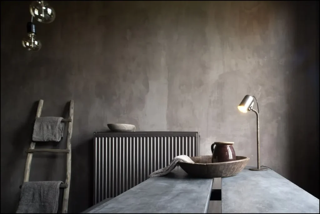 Modern interior with a decorative concrete wall finish.