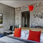 Modern interior with a realistic concrete-effect wall.