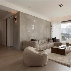 Decorative concrete wall in a bright modern room.