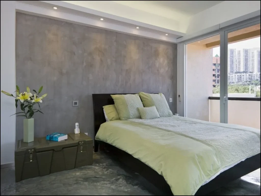 Decorative concrete wall adding texture to the interior.