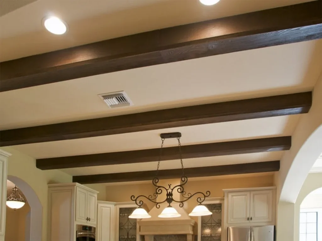 Minimalist room with clean-lined decorative wooden beams overhead.