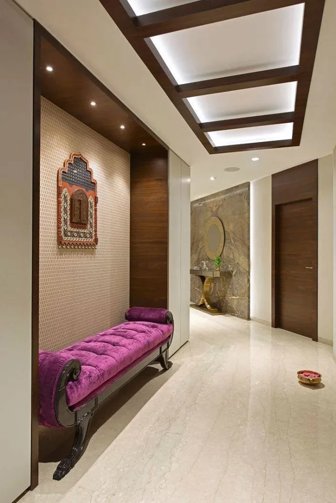 Cozy bedroom with light-colored wooden beams on a vaulted ceiling.