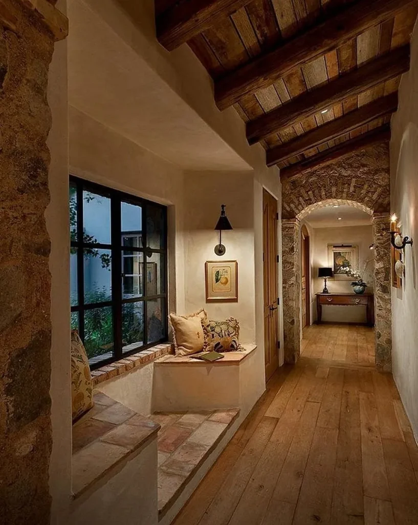 Modern room featuring faux wood decorative beams on a grey ceiling.