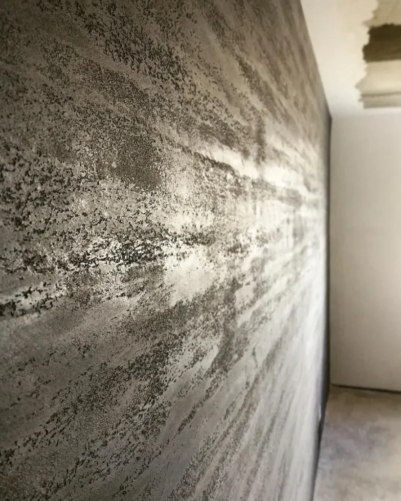Decorative concrete finish in a bright living room interior.
