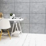Textured decorative wall inspired by concrete in a living room.