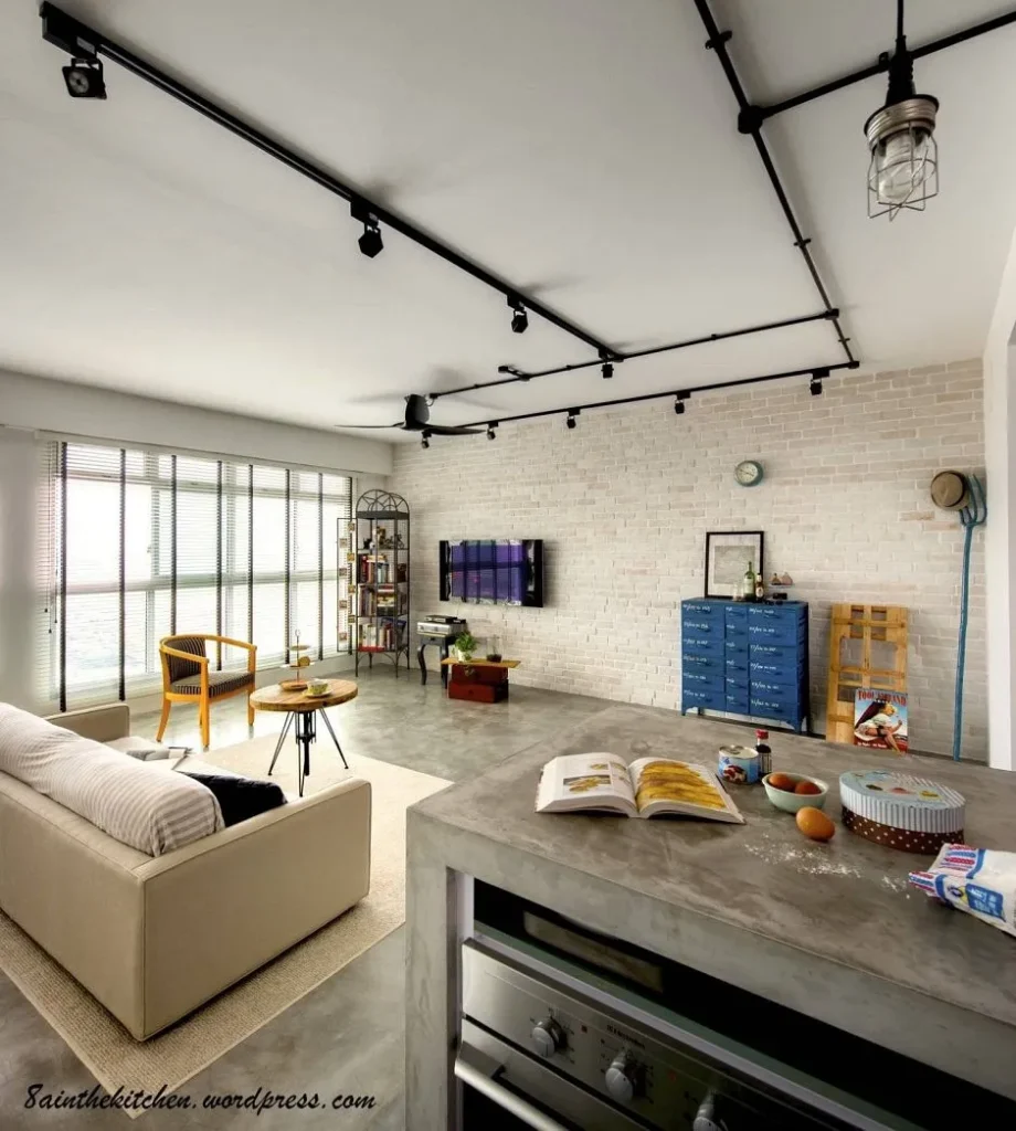 Matte black wire mesh pendant lamp in a contemporary room.