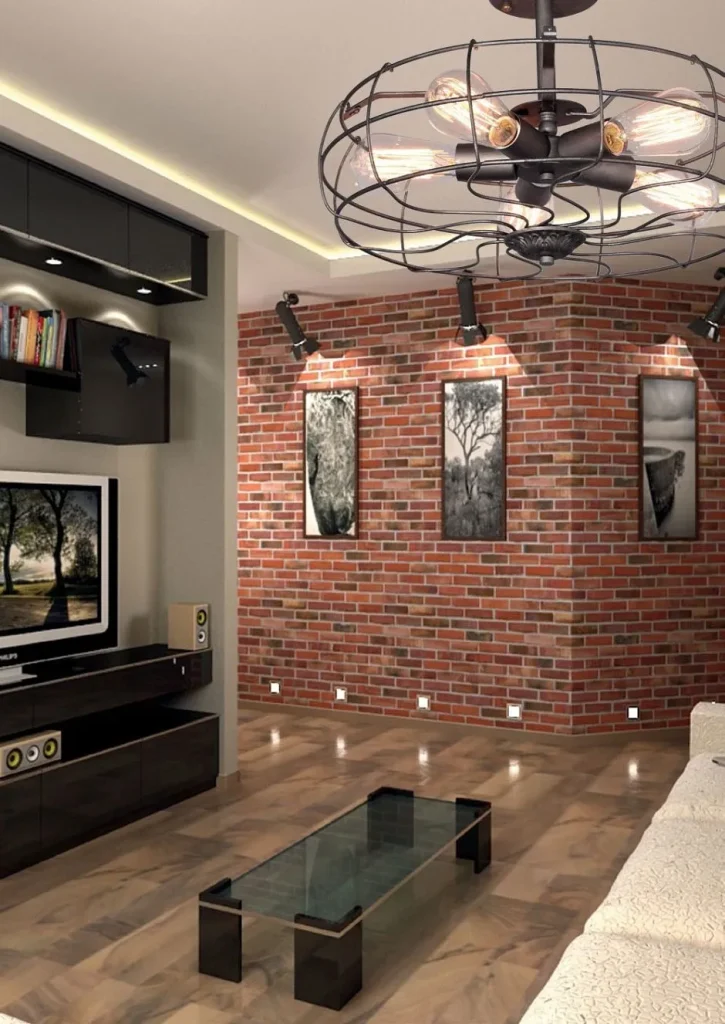 Black metal industrial pendant light hanging in a loft-style room.