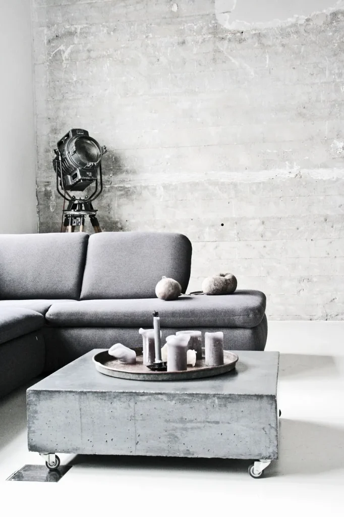 Contemporary loft interior with light-colored microcement wall finishes.