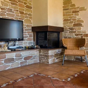 Decorative plaster stone wall cladding in a contemporary living space