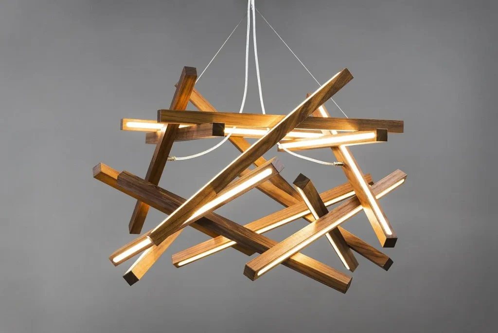 Clear glass dome pendant light with an exposed filament bulb.