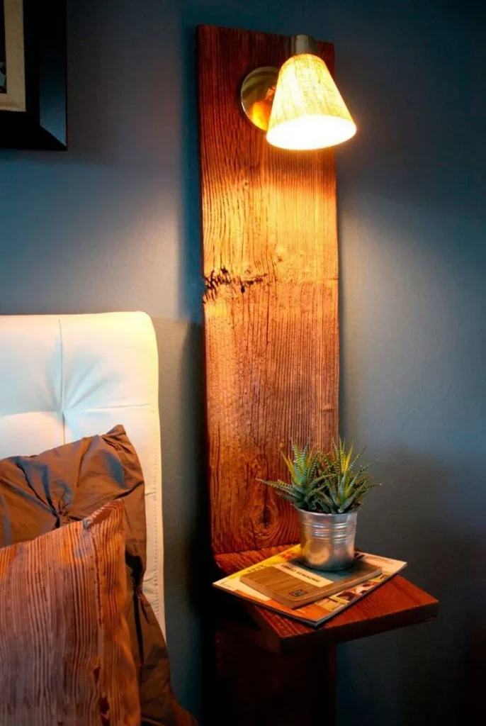 Retro brass and black metal wall sconce with a globe shade.