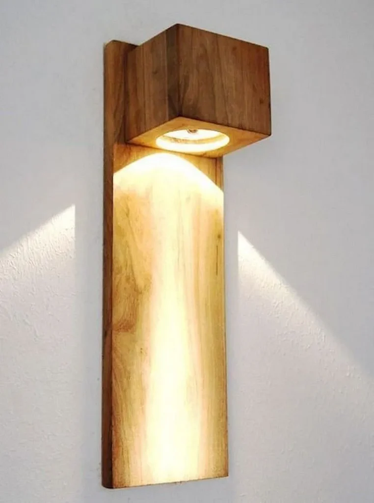 Black metal cage ceiling light fixture mounted flush to the ceiling.