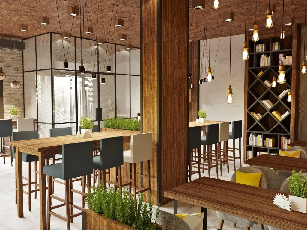 Cafe dining space featuring a combination of brick walls and metal furniture.