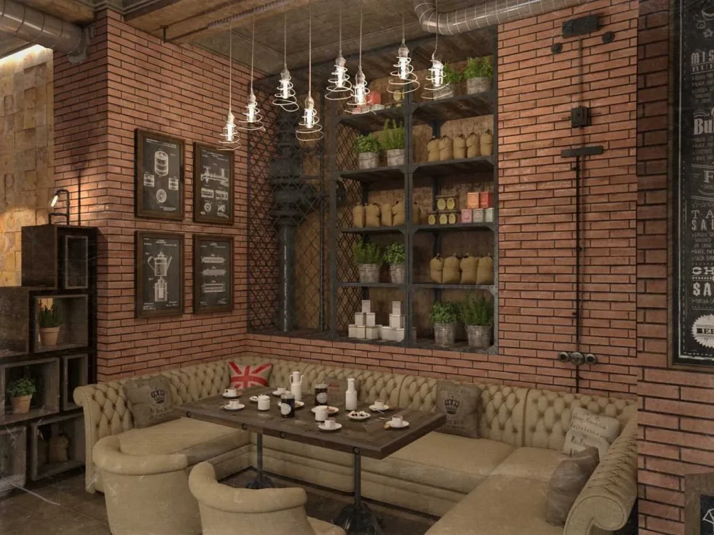 Seating area in a loft cafe featuring vintage metal chairs and timber tables.