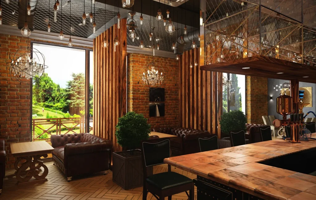 Comfortable lounge area in a loft-style cafe with leather armchairs.