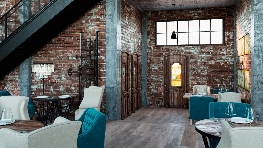 Seating area in a loft cafe featuring vintage metal chairs and timber tables.