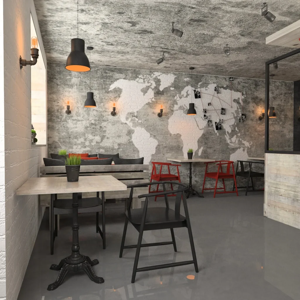 High-ceiling loft cafe with exposed air ducts and large windows.