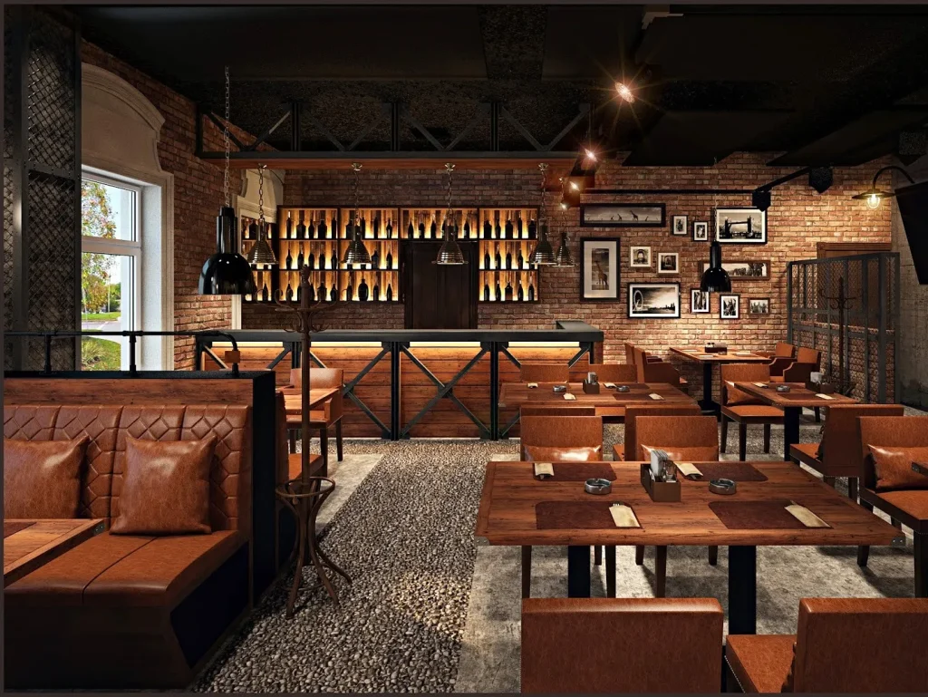 Loft cafe interior with suspended green plants and industrial lighting fixtures.
